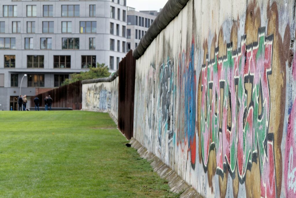 a wall that has some graffiti on it